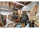 Garage with open door, workbench, and ample space for projects at 39252 Kimberly Ave, Zephyrhills, FL 33540