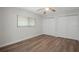 Bedroom with a window, new flooring, and closet at 4315 Flexer Dr, Hernando Beach, FL 34607