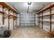Spacious garage with shelving along the walls at 4315 Flexer Dr, Hernando Beach, FL 34607