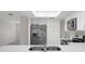 Bright kitchen with stainless steel appliances, quartz countertops, and lots of storage at 4315 Flexer Dr, Hernando Beach, FL 34607