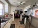 Functional kitchen with stainless steel appliances, tile flooring and ample countertop space at 4419 Atwood Dr, Tampa, FL 33610