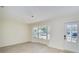 Living room featuring a bright bay window that floods the room with natural light at 4700 Chancellor Ne St, St Petersburg, FL 33703