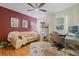 This living room features stylish decor and comfortable seating for work and play at 4805 E Regnas Ave, Tampa, FL 33617