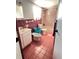 Bathroom featuring pink tile and a shower/tub combo at 4812 Bonita Vista Dr, Tampa, FL 33634