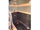 Shower featuring black tile and a blue and tan tile stripe at 4812 Bonita Vista Dr, Tampa, FL 33634