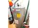 Close-up of a Rheem hot water heater with an energy guide sticker visible at 4812 Bonita Vista Dr, Tampa, FL 33634