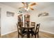Cozy dining area with a round glass table, seating for four, and stylish decor at 5130 Brittany S Dr # 604, St Petersburg, FL 33715