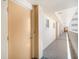 Hallway outside a condo shows the exterior views and access to other units at 5130 Brittany S Dr # 604, St Petersburg, FL 33715