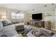 Cozy living room with plush seating, water view and decorative accents showcasing the comforts of home at 5130 Brittany S Dr # 604, St Petersburg, FL 33715
