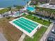 Beautiful shuffleboard courts on the property with lush landscaping, sidewalks, benches and parking at 5130 Brittany S Dr # 604, St Petersburg, FL 33715