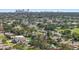 Scenic aerial neighborhood view with mature trees, nearby river, and a glimpse of the city at 5340 Denver Ne St, St Petersburg, FL 33703