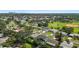 An aerial view showcasing the property's location within a residential neighborhood near a baseball field and green spaces at 5340 Denver Ne St, St Petersburg, FL 33703