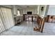 Kitchen undergoing renovations with white cabinets and tile flooring at 5340 Denver Ne St, St Petersburg, FL 33703