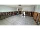 Open-concept living room with tile flooring undergoing renovations at 5340 Denver Ne St, St Petersburg, FL 33703