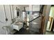 Spacious utility room featuring a sink, water heater, and HVAC system at 5340 Denver Ne St, St Petersburg, FL 33703