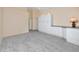 Spacious carpeted bedroom with large built-in storage and ceiling fan at 5524 Salem Square N Dr, Palm Harbor, FL 34685