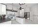 Eat-in kitchen includes an island, lots of cabinets, and stainless steel appliances at 5524 Salem Square N Dr, Palm Harbor, FL 34685