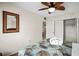 Cozy bedroom showcases bright walls, ceiling fan and closet for ample storage at 600 71St Ave # 18, St Pete Beach, FL 33706