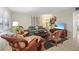 A comfortable living room with a tropical theme, perfect for relaxation and entertaining at 600 71St Ave # 18, St Pete Beach, FL 33706