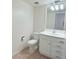 Clean bathroom with white fixtures and a neutral tile floor at 6206 Dewdrop Way # 0, Temple Terrace, FL 33617