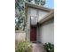 Attractive townhome with a lovely front door and covered entry at 6206 Dewdrop Way # 0, Temple Terrace, FL 33617
