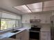 Updated kitchen featuring stainless steel appliances and sleek countertops at 6206 Dewdrop Way # 0, Temple Terrace, FL 33617