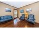 Inviting living room with hardwood floors, stylish seating, and natural light at 6406 Congress St, New Port Richey, FL 34653