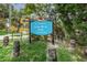 Colorful sign for New Port Richey's Cotee River Park near Grand Boulevard at 6406 Congress St, New Port Richey, FL 34653