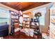 This storage room, with warm lighting, showcases its ample space for organizing and keeping items neat at 6406 Congress St, New Port Richey, FL 34653