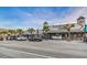 Street view with cars parked along the road and several store fronts and restuarants at 6406 Congress St, New Port Richey, FL 34653