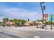 Street view showcasing a charming, local storefront with trees and a bright blue sky at 6406 Congress St, New Port Richey, FL 34653