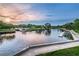 Scenic waterfront view with calm water reflecting the blue sky at sunset at 6406 Congress St, New Port Richey, FL 34653