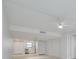 This room has storage, a ceiling fan, and water views from a window at 7050 Sunset S Dr # 1401, South Pasadena, FL 33707