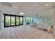 The bright lobby features ample seating, lots of windows and tile flooring at 7050 Sunset S Dr # 1401, South Pasadena, FL 33707