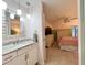 The ensuite bathroom leads into the bedroom at 7360 Ulmerton Rd # 16A, Largo, FL 33771