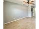 Bedroom with tile flooring, ceiling fan, and neutral-colored walls at 7360 Ulmerton Rd # 16A, Largo, FL 33771