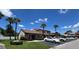 Beautiful multi-story homes with well-kept lawns, surrounded by palm trees, and ample parking spaces available at 7360 Ulmerton Rd # 16A, Largo, FL 33771