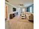 Inviting living room with tile floors, ceiling fan and comfortable sectional sofa at 7360 Ulmerton Rd # 16A, Largo, FL 33771