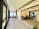 The back of the house has a covered patio with tile flooring at 7360 Ulmerton Rd # 16A, Largo, FL 33771