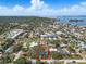 An aerial view that highlights the property's location within a charming coastal community with water access at 75 New Jersey Dr, Dunedin, FL 34698
