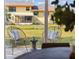 Outdoor patio area with comfortable seating at 75 New Jersey Dr, Dunedin, FL 34698
