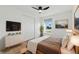 Well-lit bedroom with closet, contemporary design, and comfortable furnishings at 8418 Westridge Dr, Tampa, FL 33615