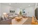 Inviting living room with neutral tones, stylish furniture, and a bright, airy feel at 8418 Westridge Dr, Tampa, FL 33615