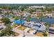 Birds eye view shows canal front homes each with its own private dock and canal access at 8711 Thornwood Ln, Tampa, FL 33615