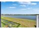 Backyard with lake view at 872 Olive Conch St, Ruskin, FL 33570
