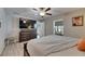 Comfortable bedroom featuring fan, modern design, and natural light at 872 Olive Conch St, Ruskin, FL 33570