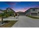 Charming single-Gathering home with a well-maintained lawn and neutral exterior paint, and a two car garage at 872 Olive Conch St, Ruskin, FL 33570