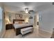 Serene main bedroom with wood floors and ensuite bathroom at 872 Olive Conch St, Ruskin, FL 33570