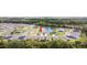 Aerial view of neighborhood highlighting home with view of the lake at 8916 Windlass Cv, Parrish, FL 34219