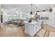 Spacious open floor plan connecting the kitchen and living area, perfect for modern living and entertaining at 8916 Windlass Cv, Parrish, FL 34219